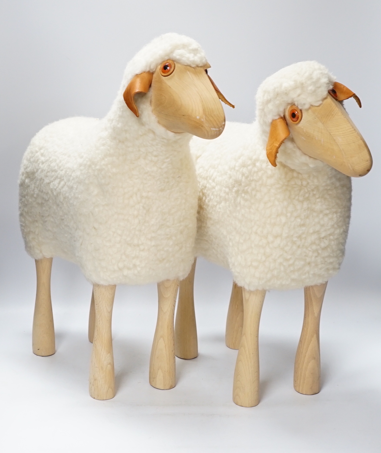A pair of 1970’s Hans Peter Krafft sheep, manufactured by Meier GbR, tallest 47cm high